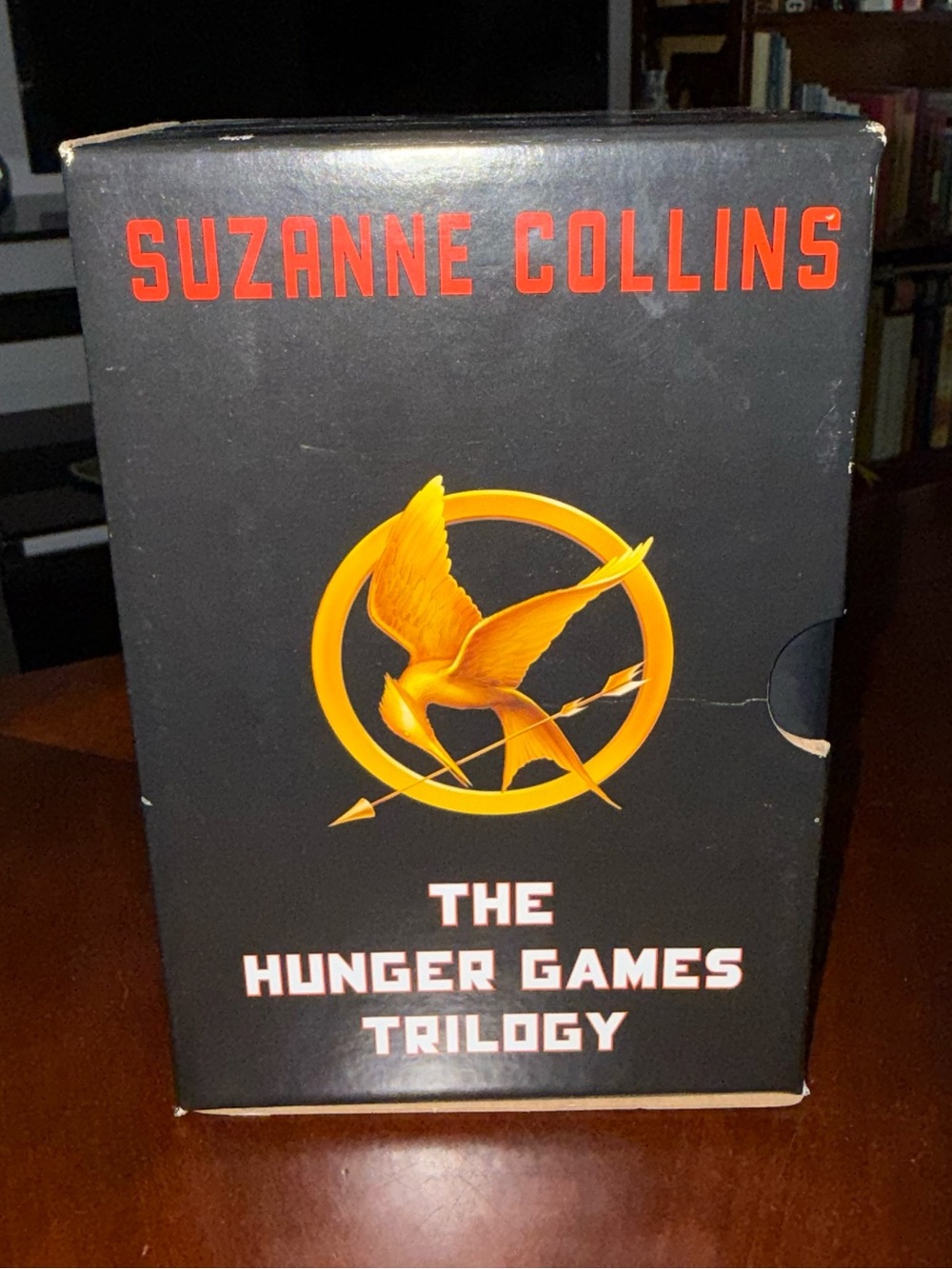 The Hunger Games Trilogy Box Set by - Black with Gold Emblem